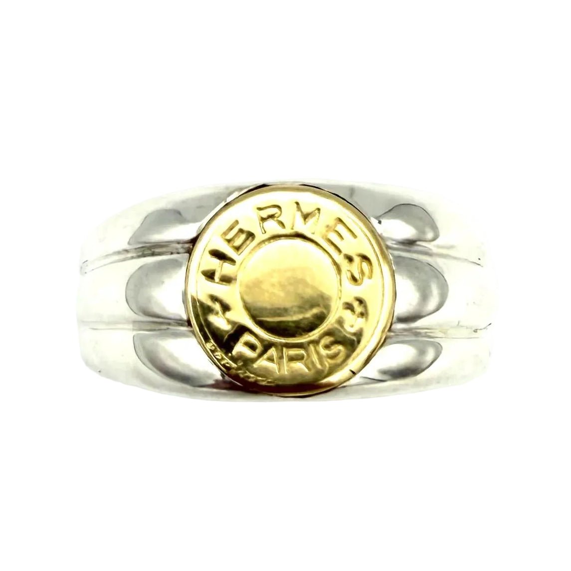 Bague Chevalière HERMÈS "Clou de selle" en or jaune et argent - Castafiore