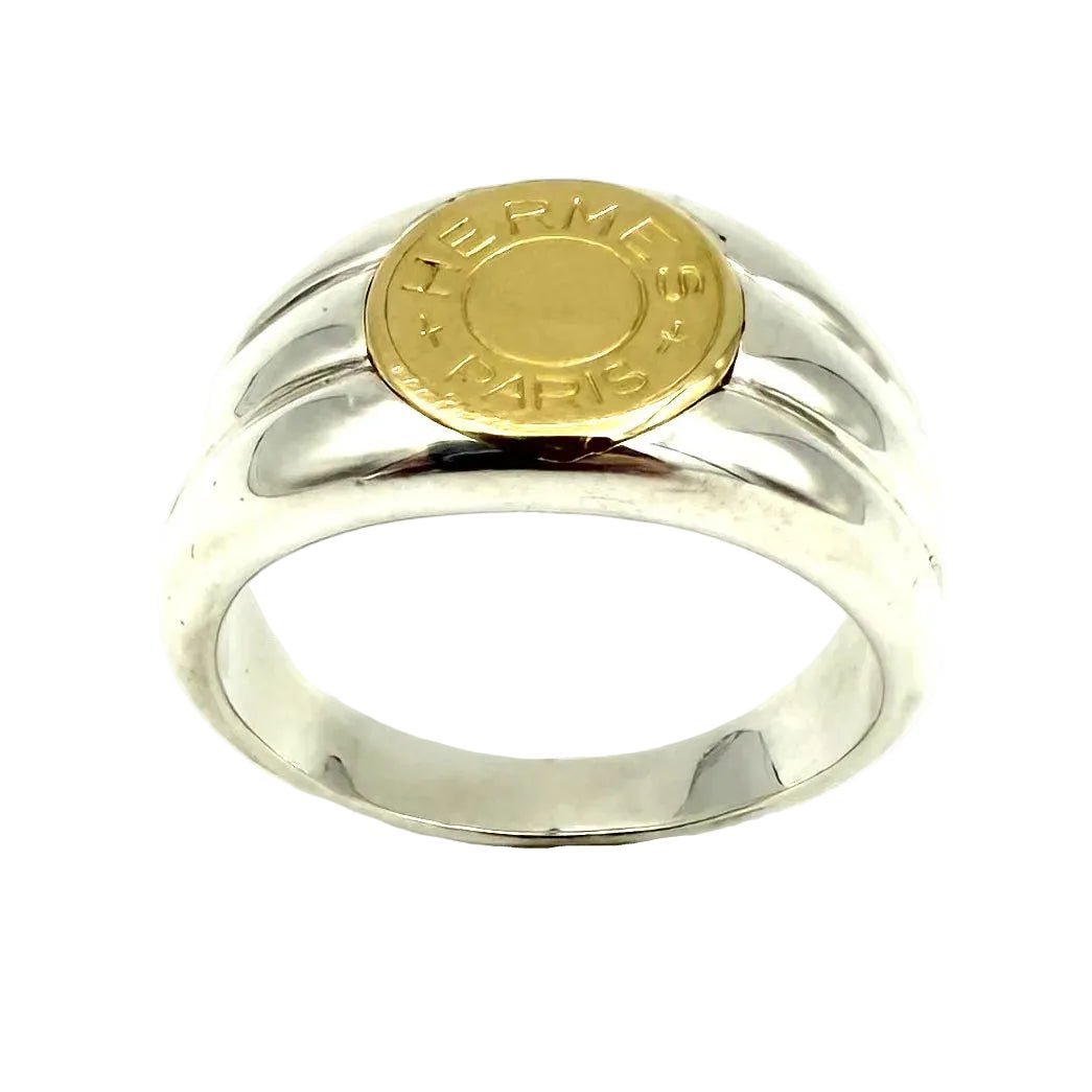 Bague Chevalière HERMÈS "Clou de selle" en or jaune et argent - Castafiore