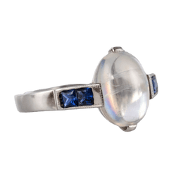 Bague Cocktail BAUME en or blanc, pierre de lune et saphirs - Castafiore