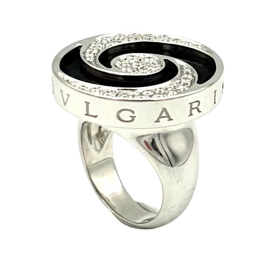 Bague Cocktail BULGARI "Optical" en or blanc, acier, onyx et diamants - Castafiore