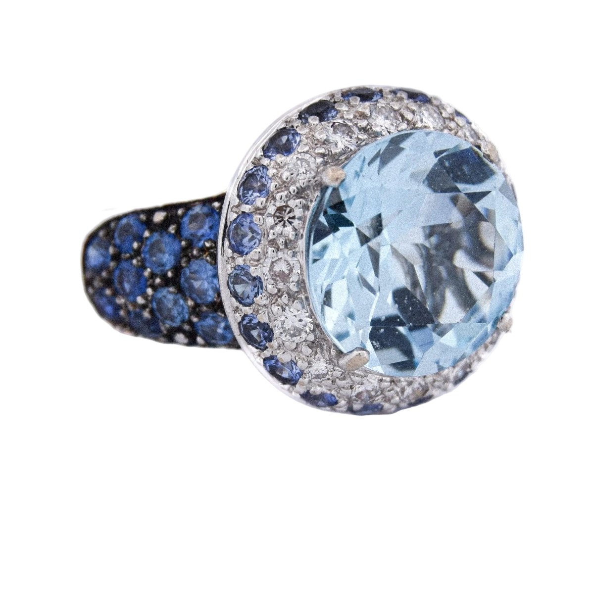 Bague Cocktail en or blanc, topaze, saphirs et diamants - Castafiore