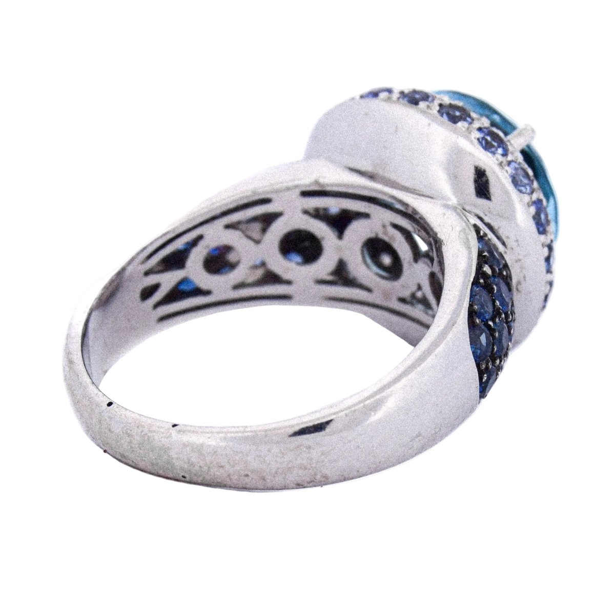 Bague Cocktail en or blanc, topaze, saphirs et diamants - Castafiore