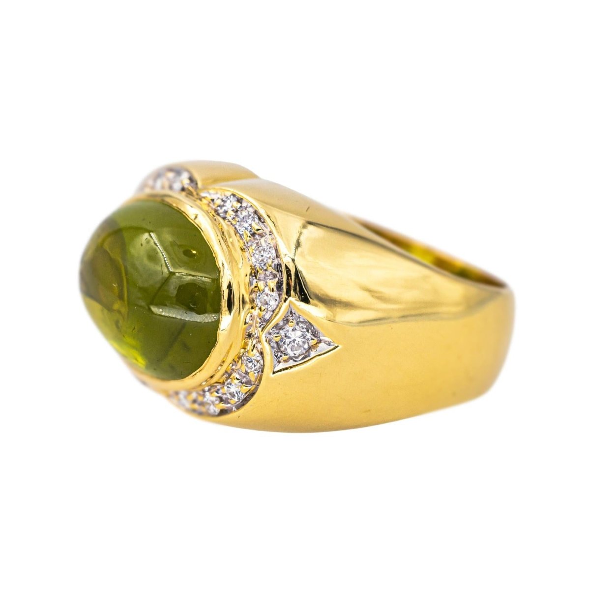Bague Cocktail en or jaune, péridot et diamants - Castafiore