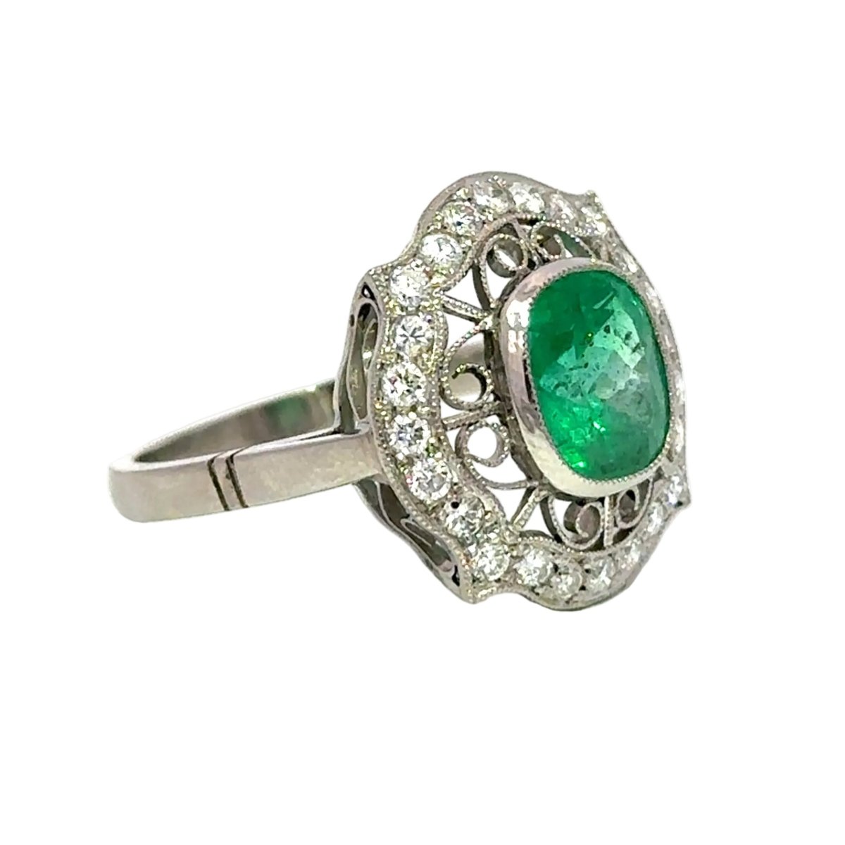 Bague Cocktail en platine, émeraude et diamants - Castafiore