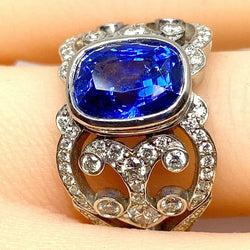 Bague coktail en or 18 carats de forme bandeau en saphir et diamants - Castafiore