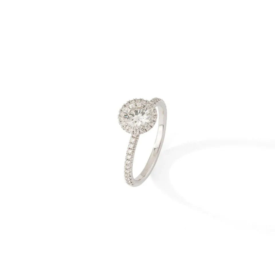 Bague de fiançailles en or blanc ornée de diamants. - Castafiore