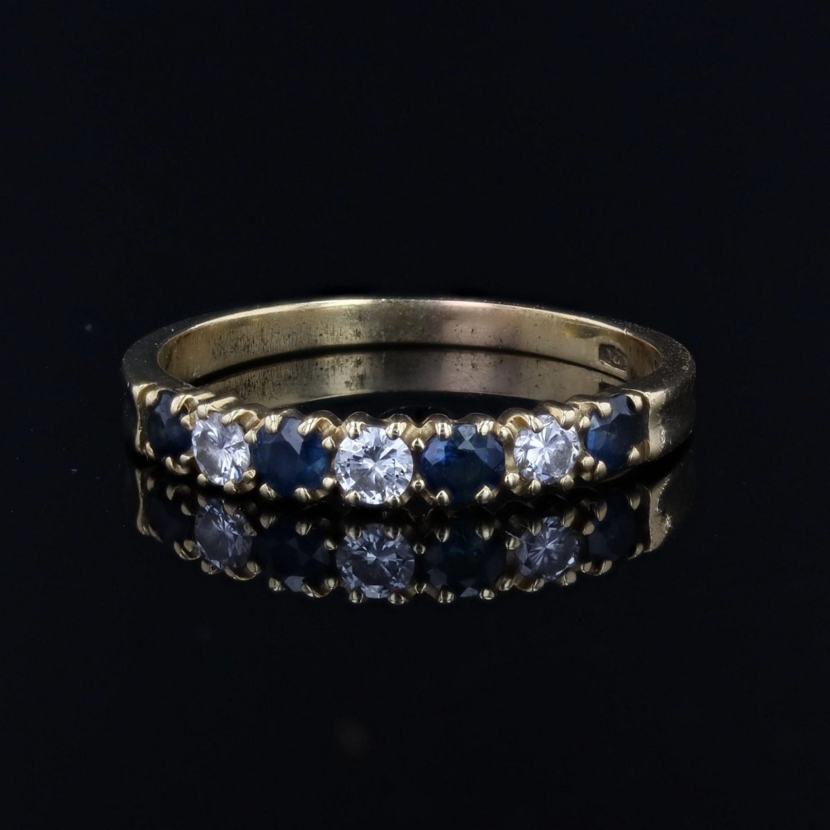 Bague demi alliance en or jaune et saphir - Castafiore