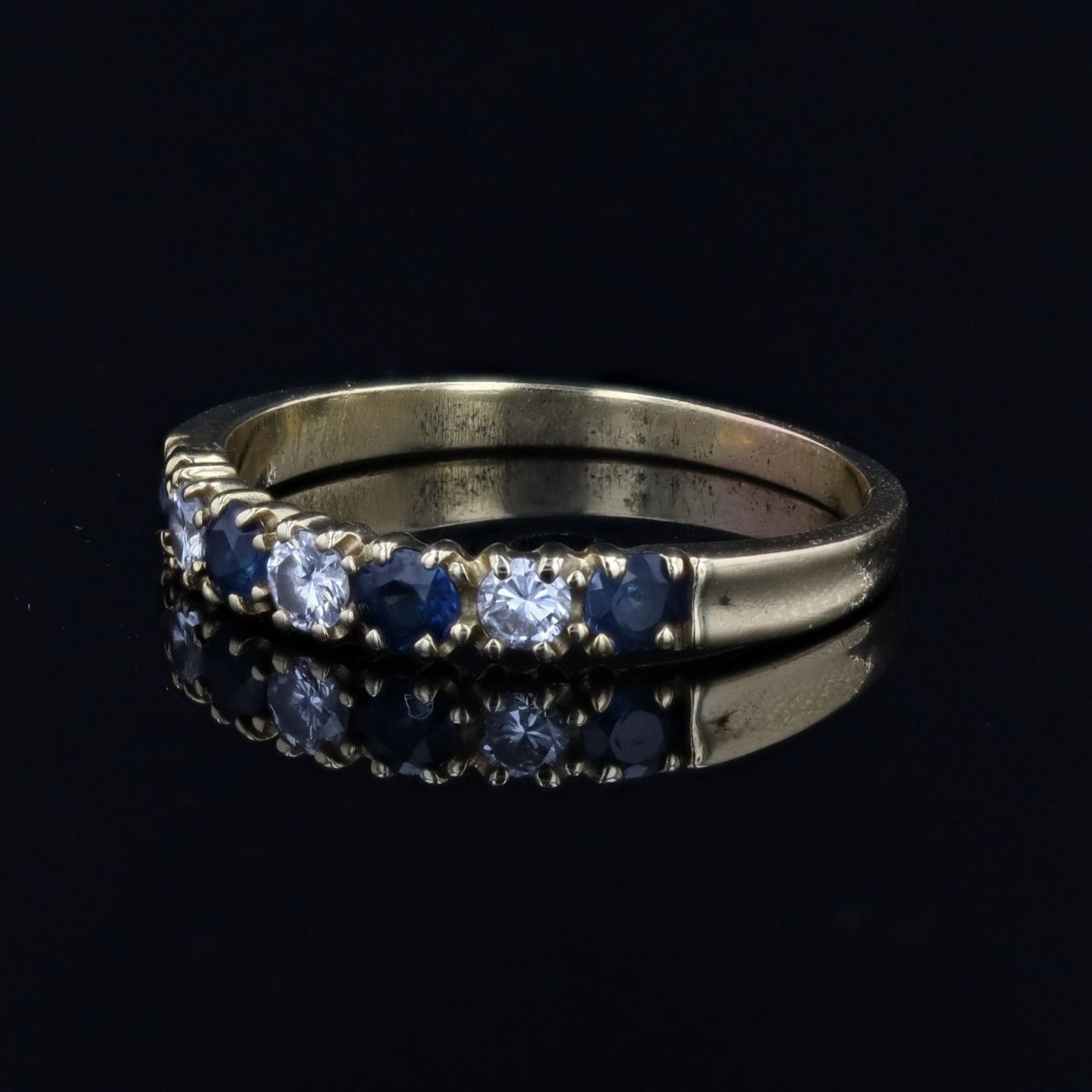 Bague demi alliance en or jaune et saphir - Castafiore