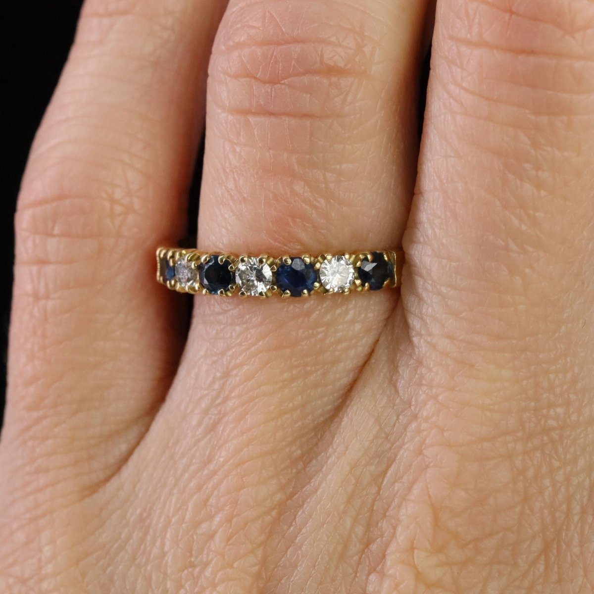 Bague demi alliance en or jaune et saphir - Castafiore