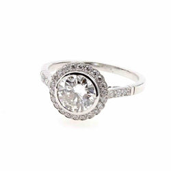 Bague diamant entourage vintage en platine - Castafiore