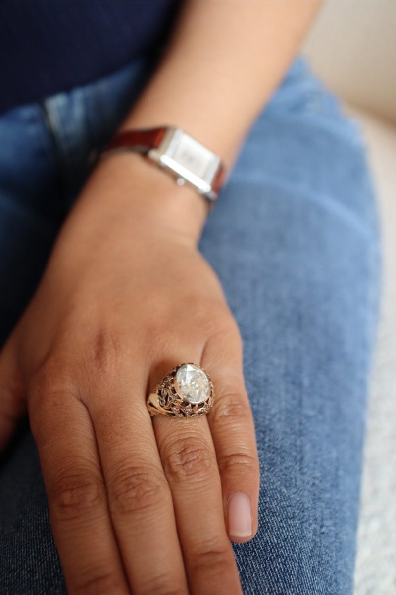 Dome ring in pink gold, set with an old oval cut diamond of