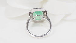 Bague double entourage en or blanc, émeraude de colombie certifiée et diamants - Castafiore