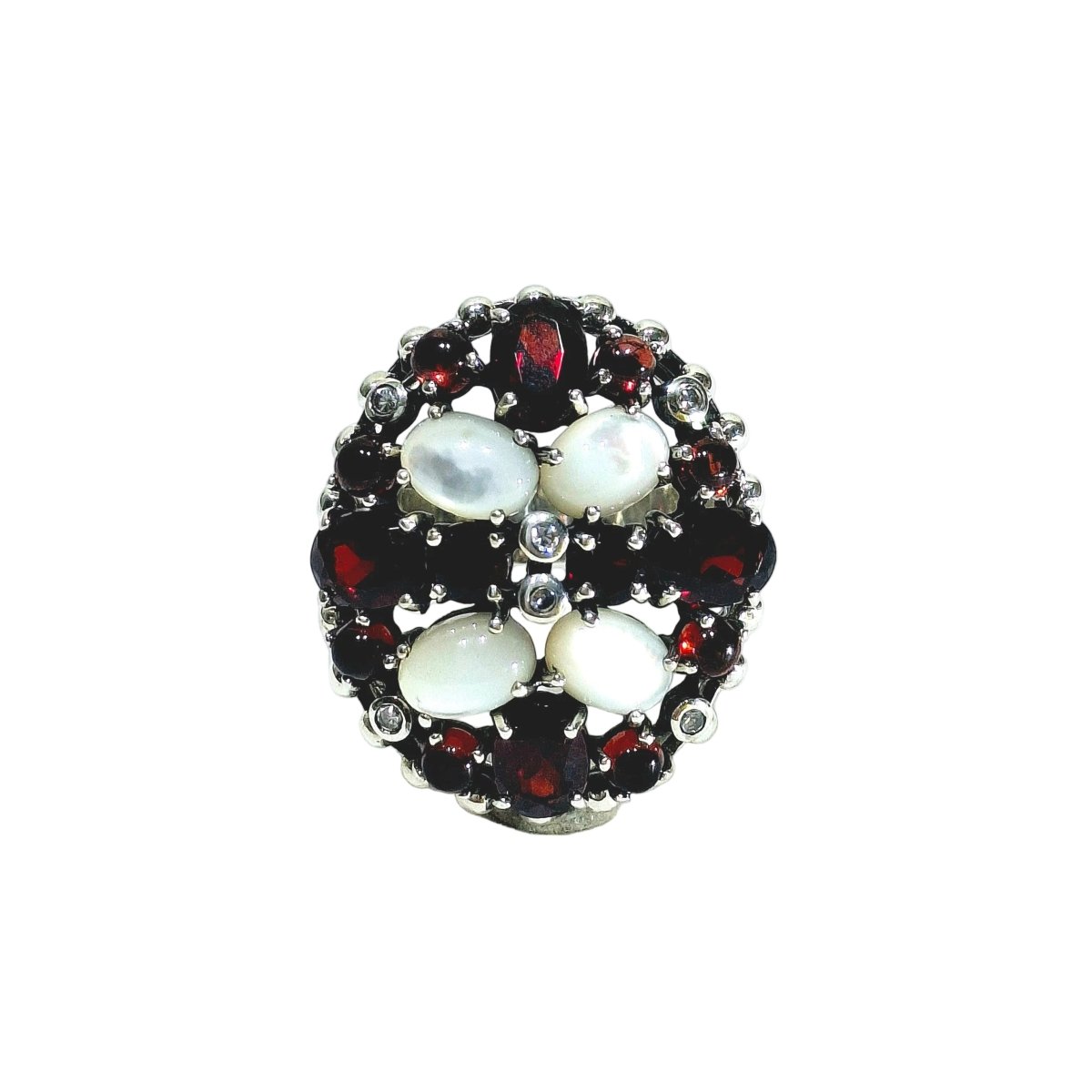 Bague en argent, nacre, grenats et zircons. - Castafiore