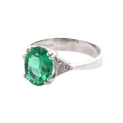 Bague en or blanc, émeraude et diamants - Castafiore