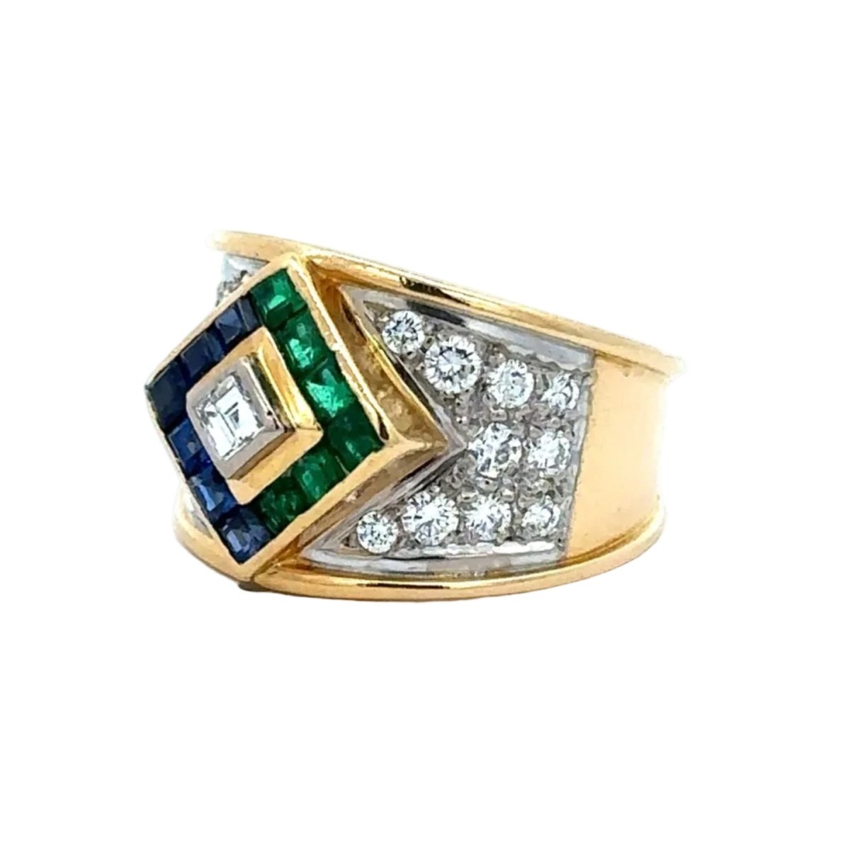 Bague en or blanc, or jaune, saphirs, émeraudes et diamants - Castafiore