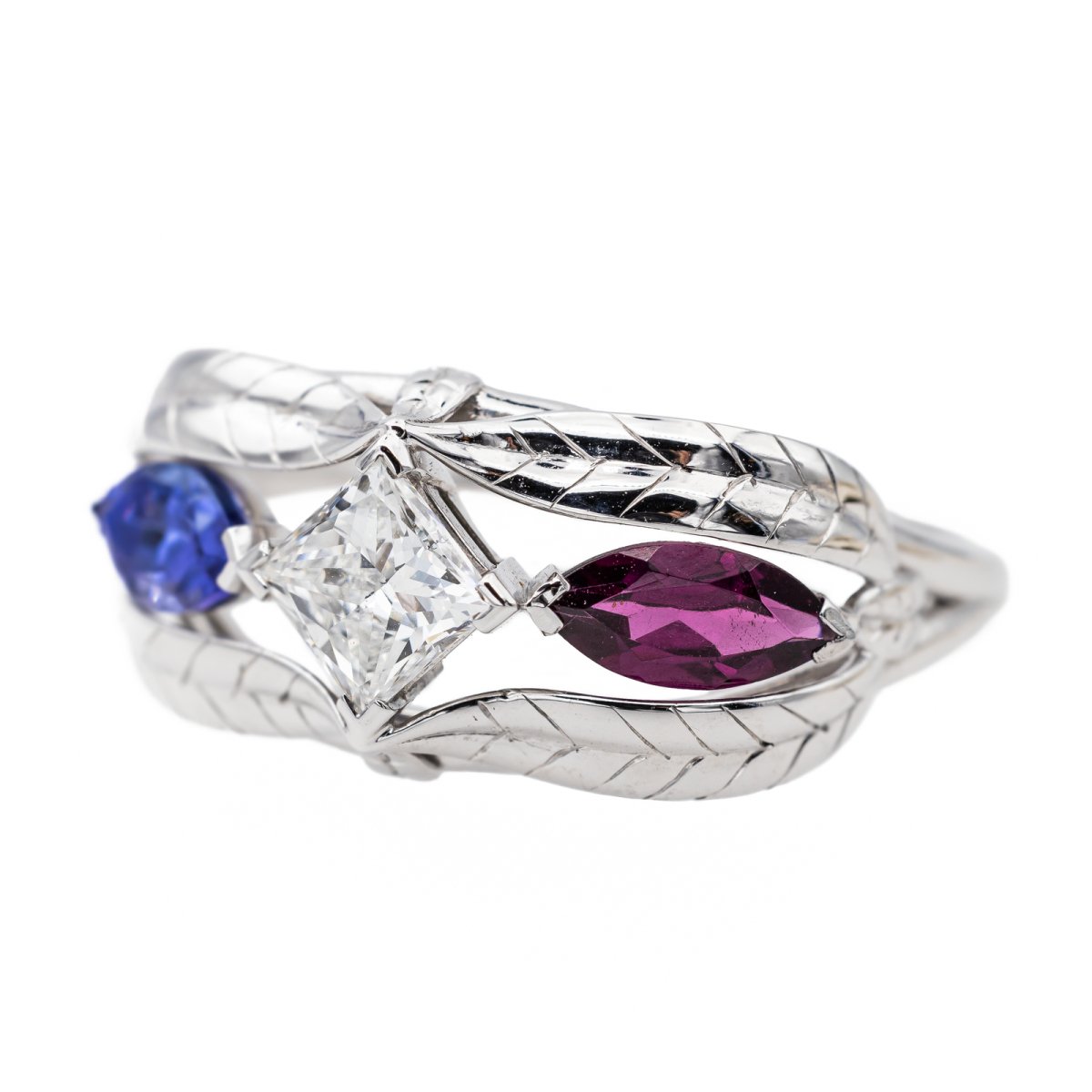 Bague en or blanc, tanzanite, grenat et diamant - Castafiore