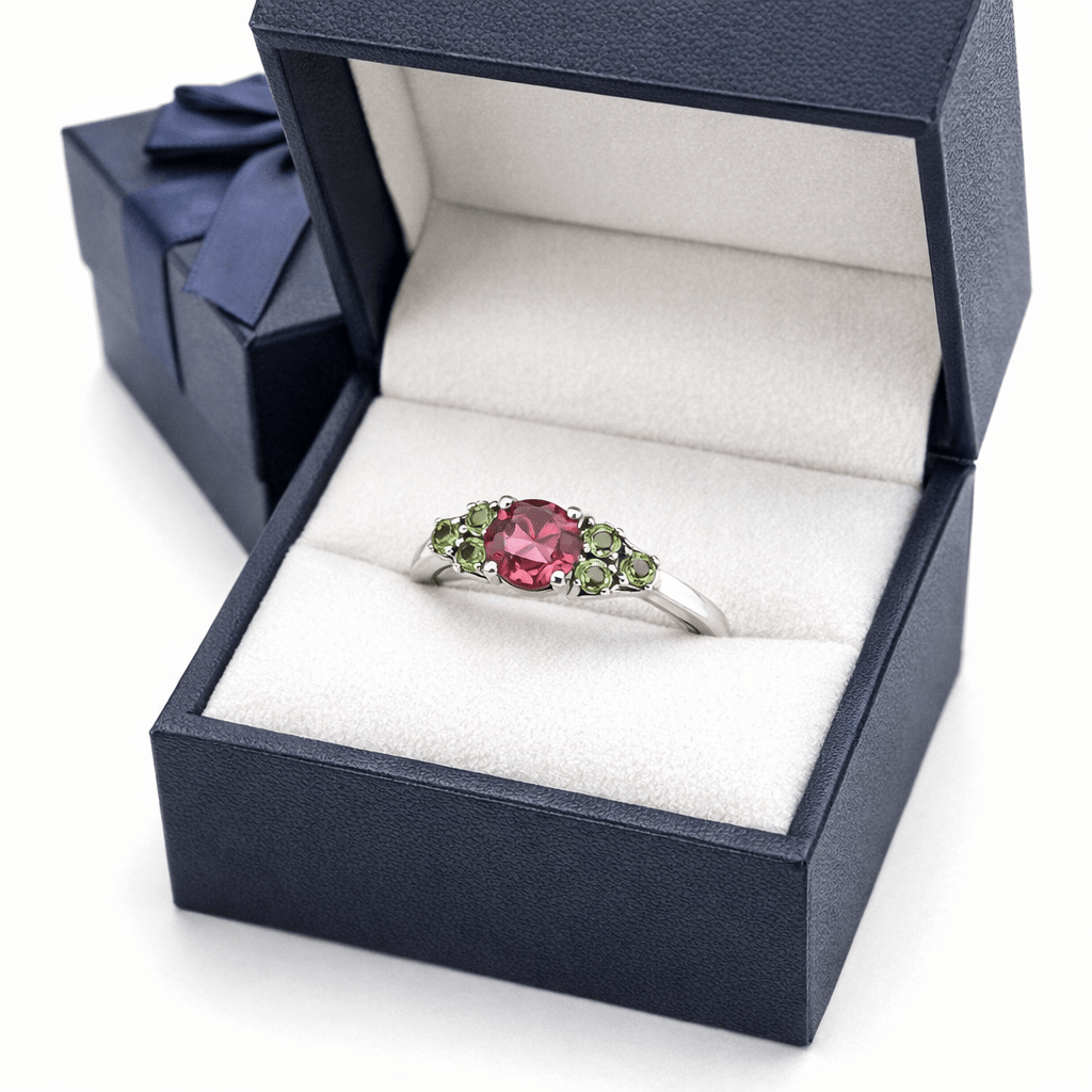 Bague en or blanc, tourmaline et péridots - Castafiore