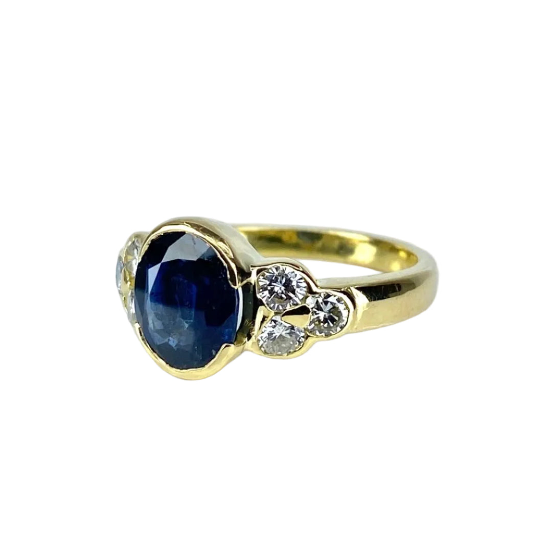 Bague en or jaune 18 carats, saphir et diamants - Castafiore