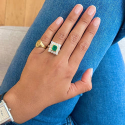 Bague en or jaune émeraude et diamants - Castafiore