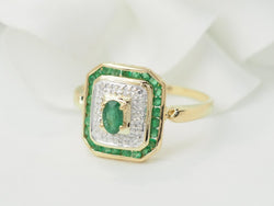 Bague en or jaune, émeraude et diamants - Castafiore