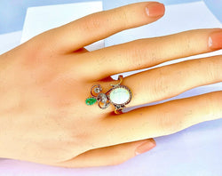 Bague en or jaune et or blanc 18 carats en opale, émeraude et diamants - Castafiore