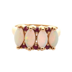 Bague en or jaune, opales et rubis - Castafiore