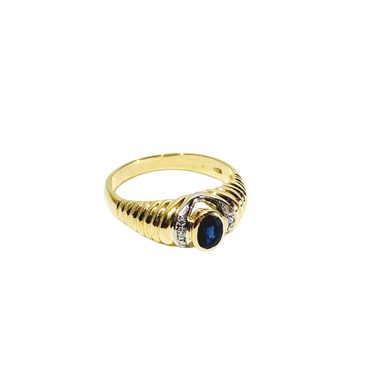 Bague en or jaune, or blanc, saphir, et diamants - Castafiore