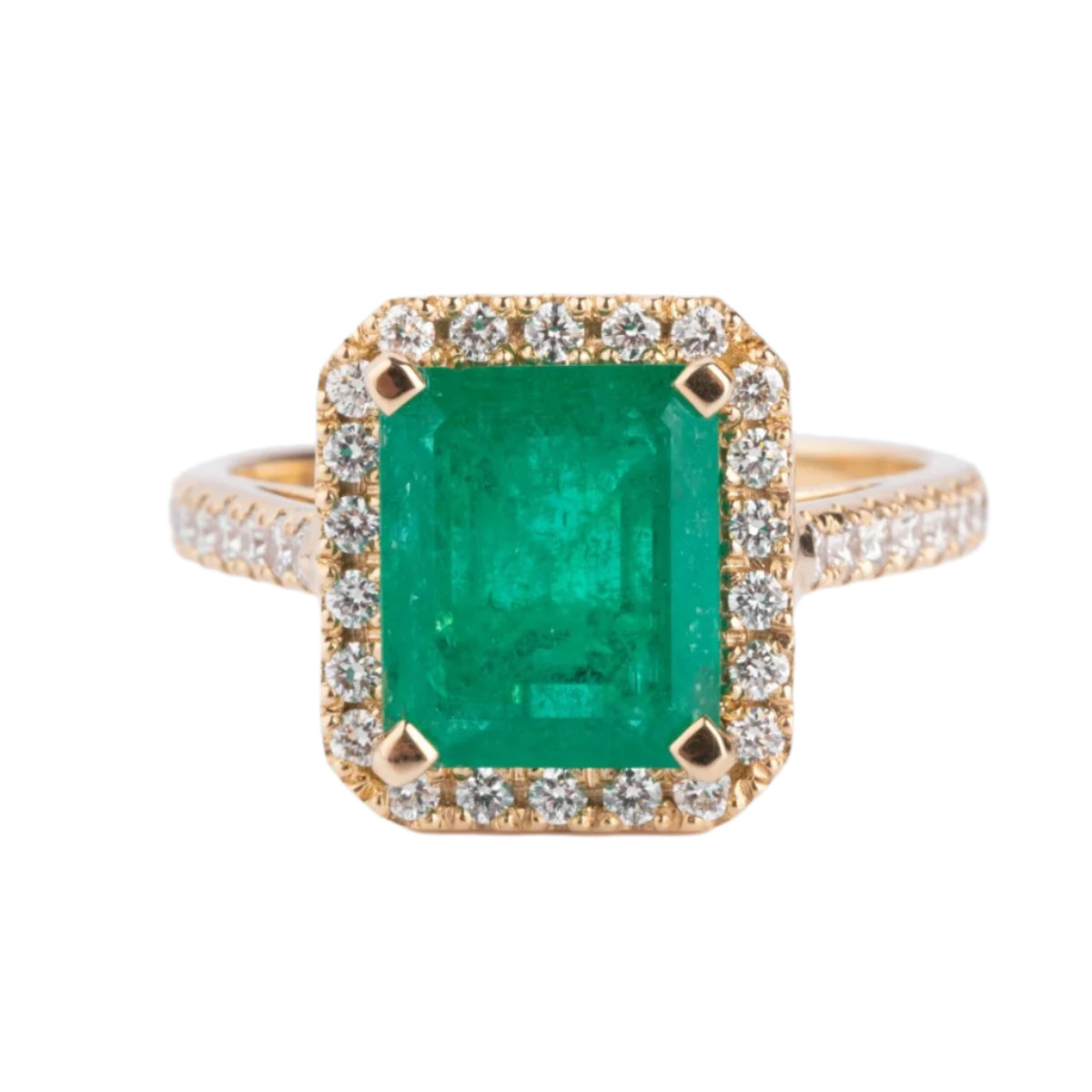 Bague en or jaune ornée d'une émeraude entourée de diamants - Castafiore