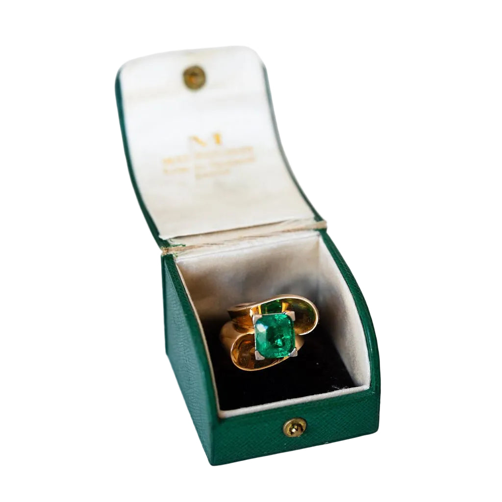 Bague en or jaune, platine et émeraude - Castafiore