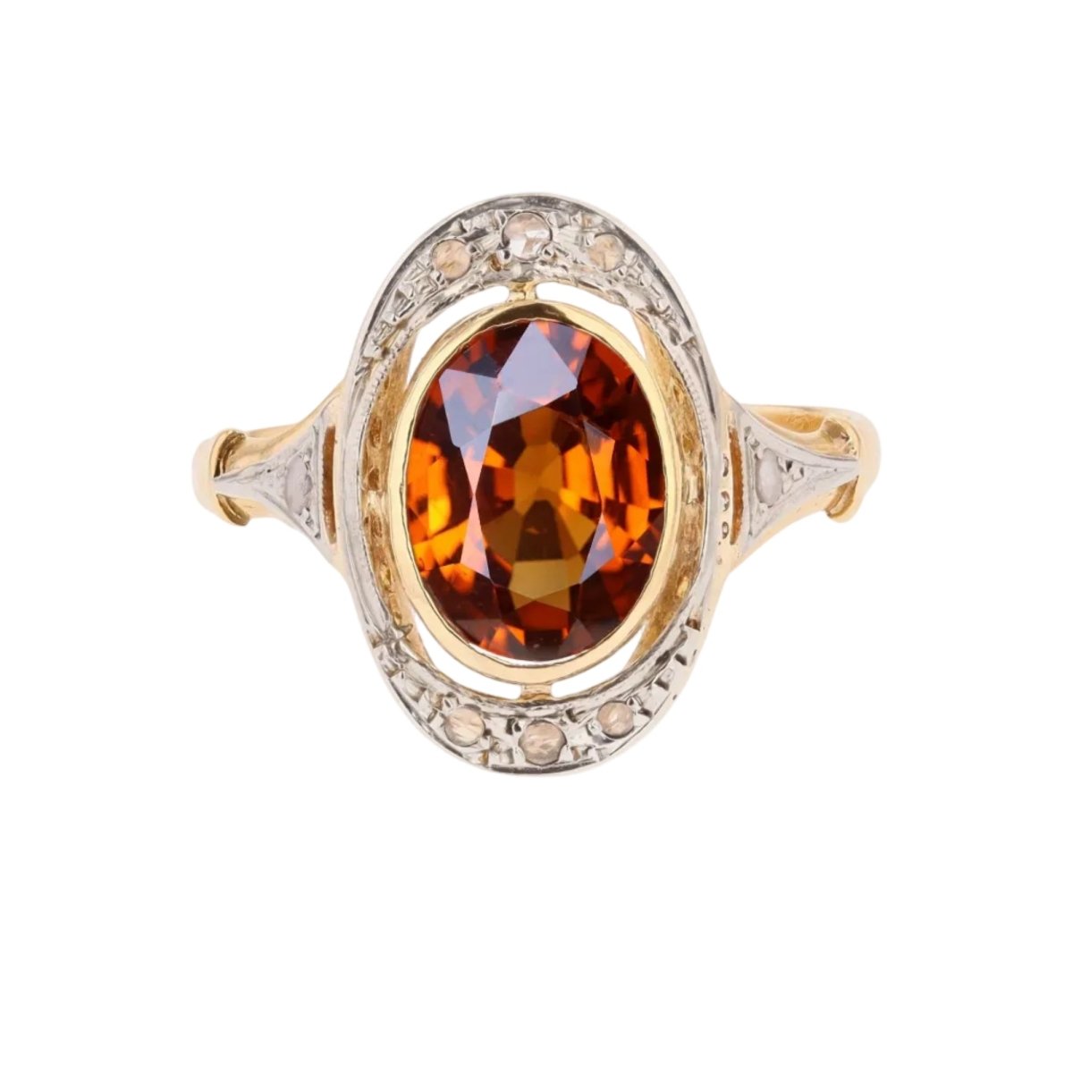 Bague en or jaune, platine, grenat et diamants - Castafiore