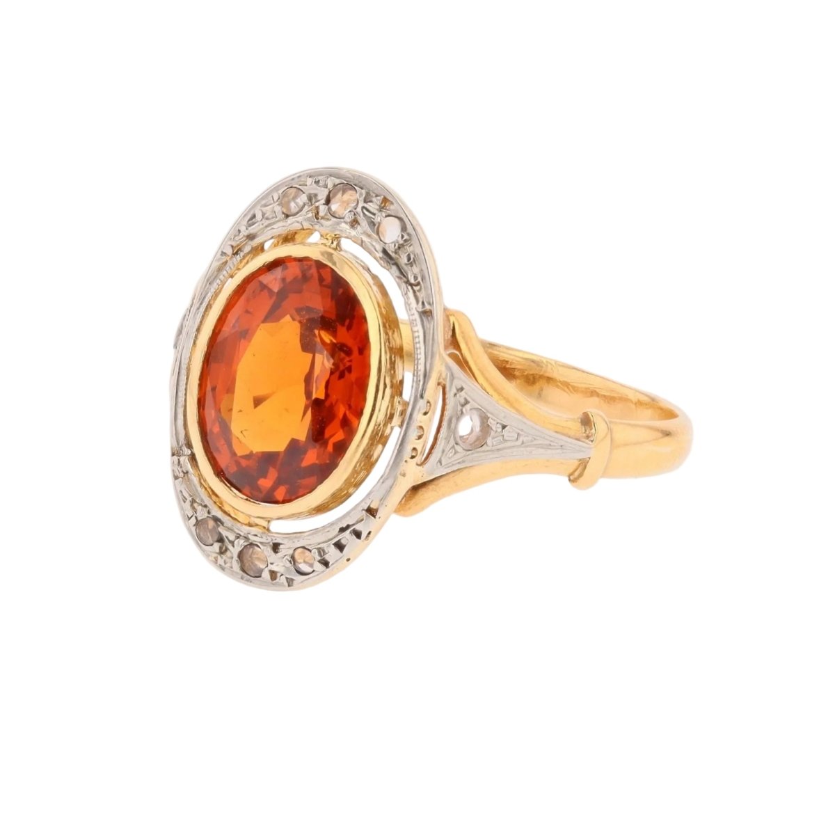 Bague en or jaune, platine, grenat et diamants - Castafiore
