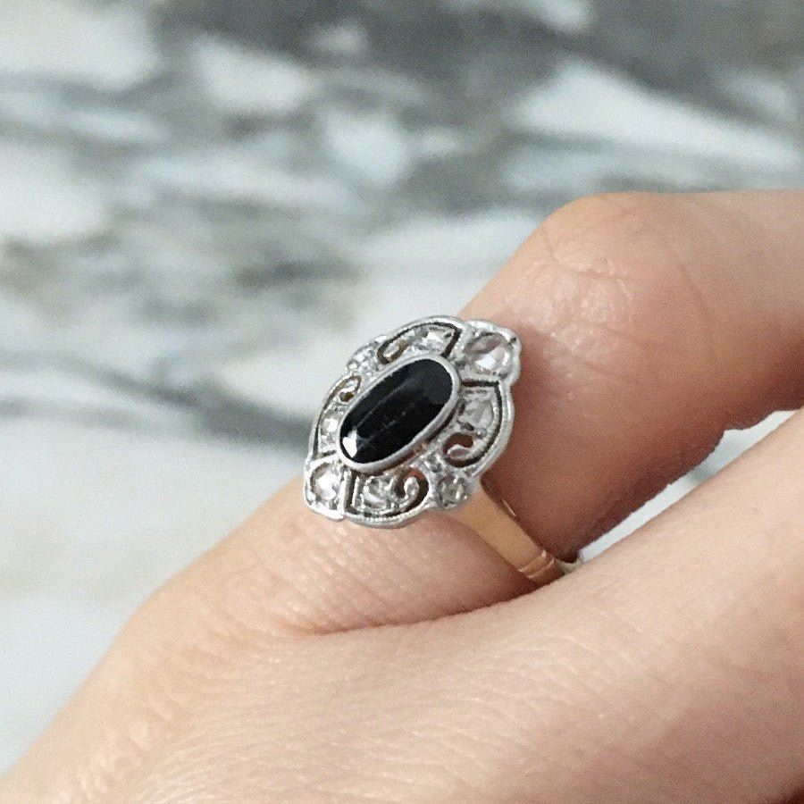 Bague en or jaune, platine, onyx et diamants - Castafiore