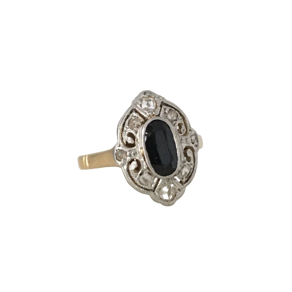 Bague en or jaune, platine, onyx et diamants - Castafiore