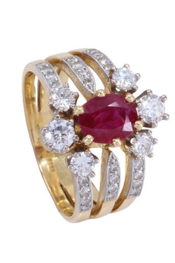Bague en or jaune, platine, rubis et diamants - Castafiore