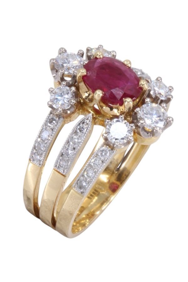 Bague en or jaune, platine, rubis et diamants - Castafiore