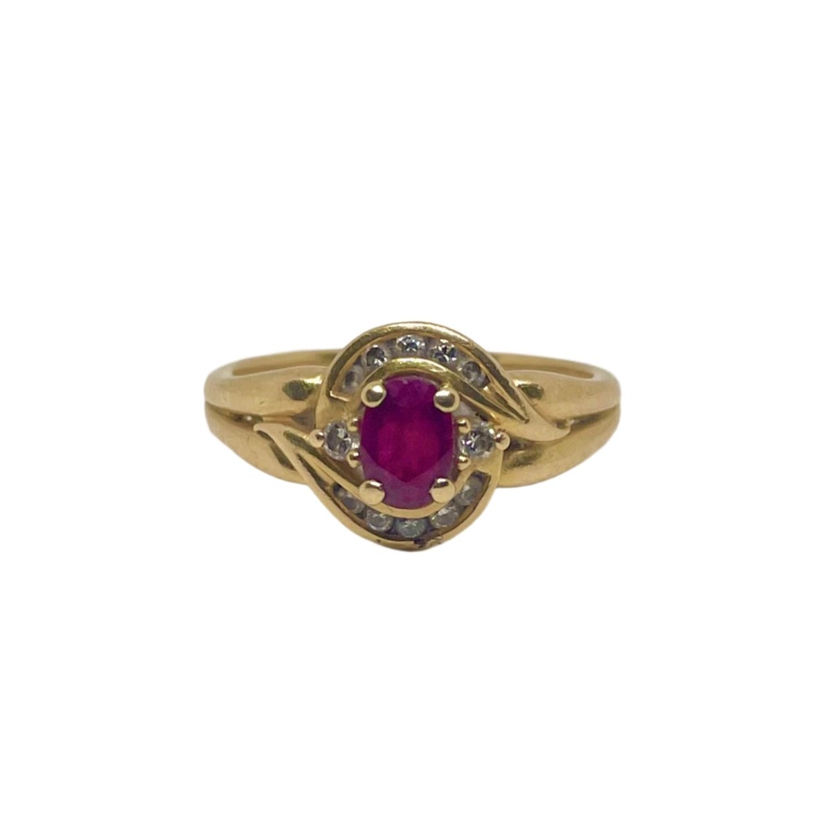 Bague en or jaune, rubis et diamants - Castafiore