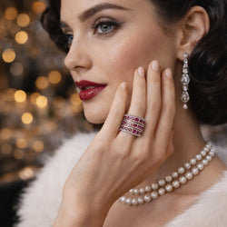 Bague en or jaune, rubis et diamants - Castafiore