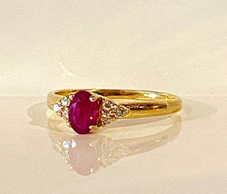 Bague en or jaune, rubis et diamants - Castafiore