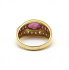 Bague en or jaune, rubis et diamants - Castafiore