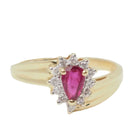 Bague en or jaune, rubis et diamants - Castafiore