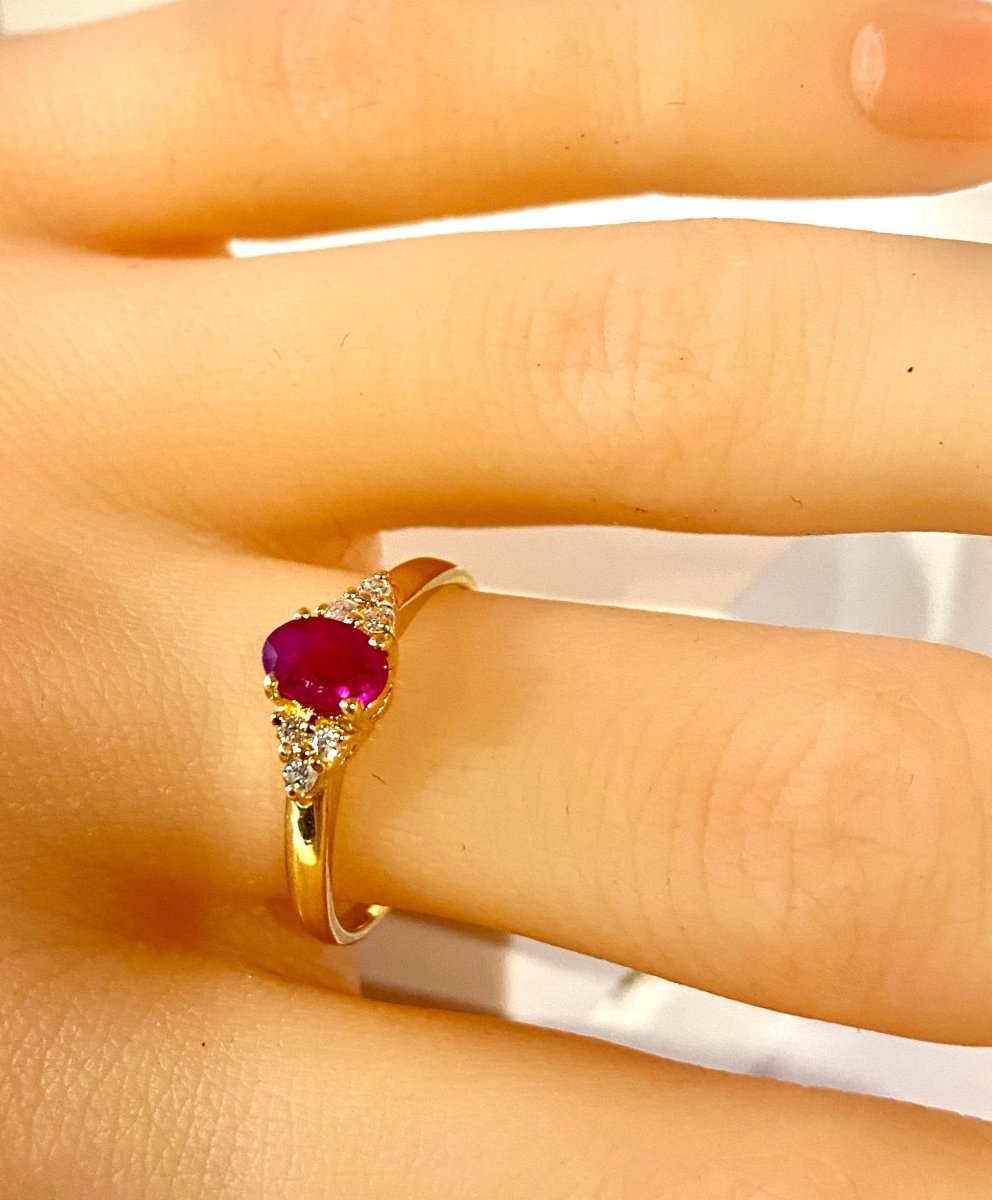 Bague en or jaune, rubis et diamants - Castafiore
