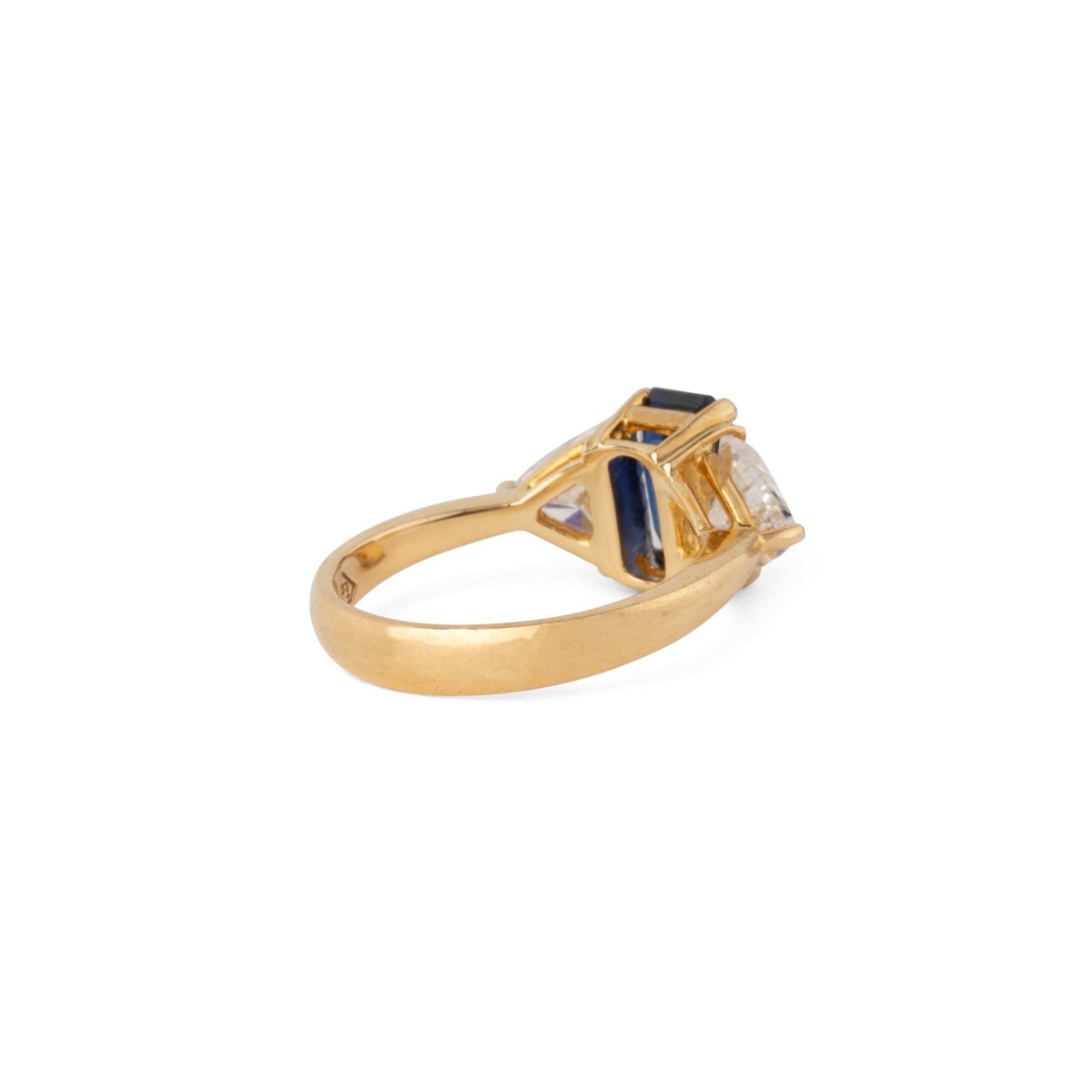 Bague Jarretière en or jaune, saphir et diamants