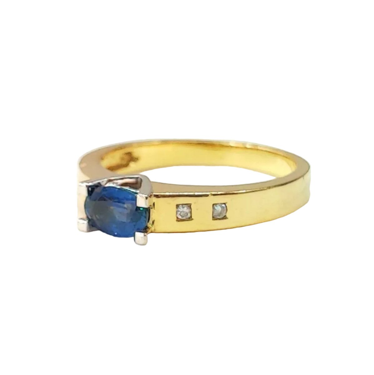 Bague en or jaune, saphir, et diamants - Castafiore