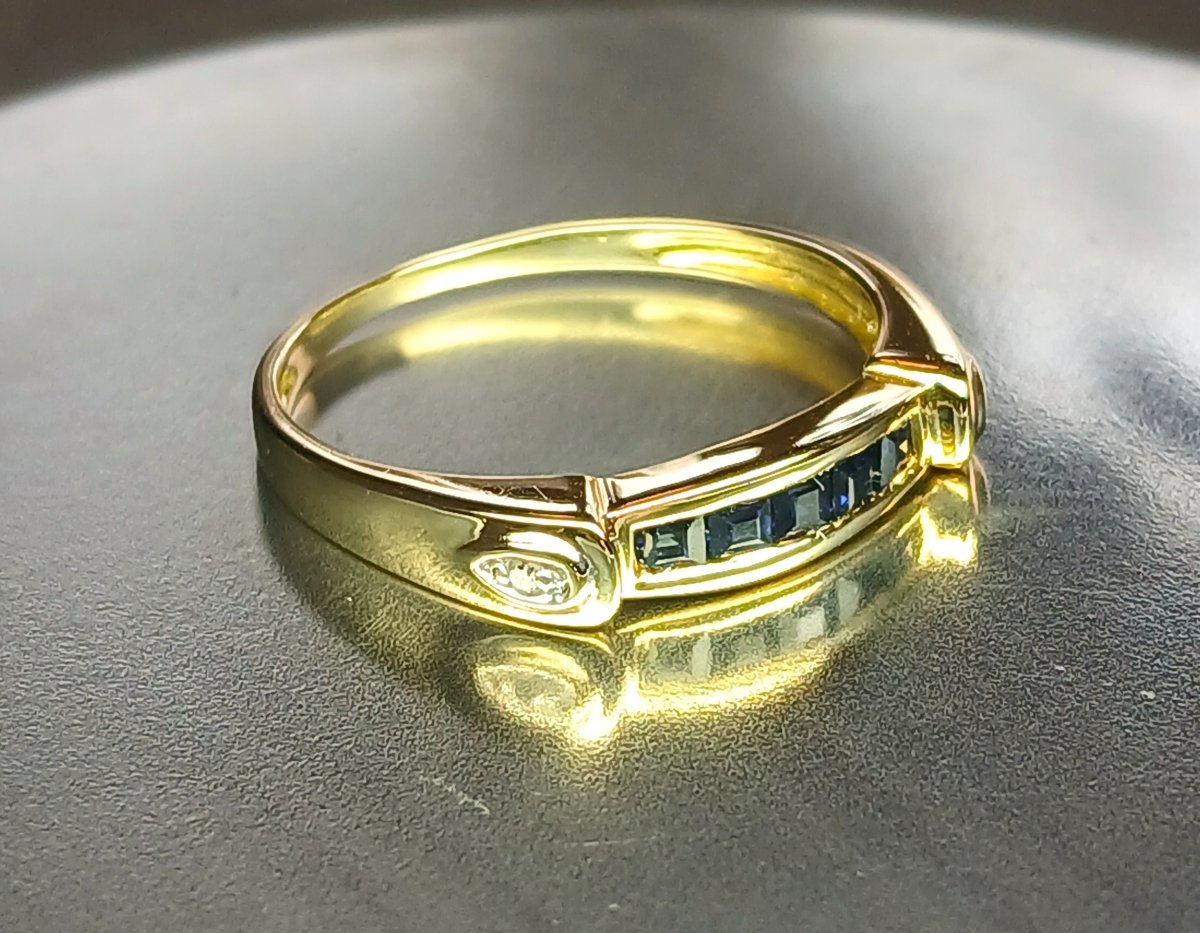 Bague en or jaune, saphirs et diamants - Castafiore