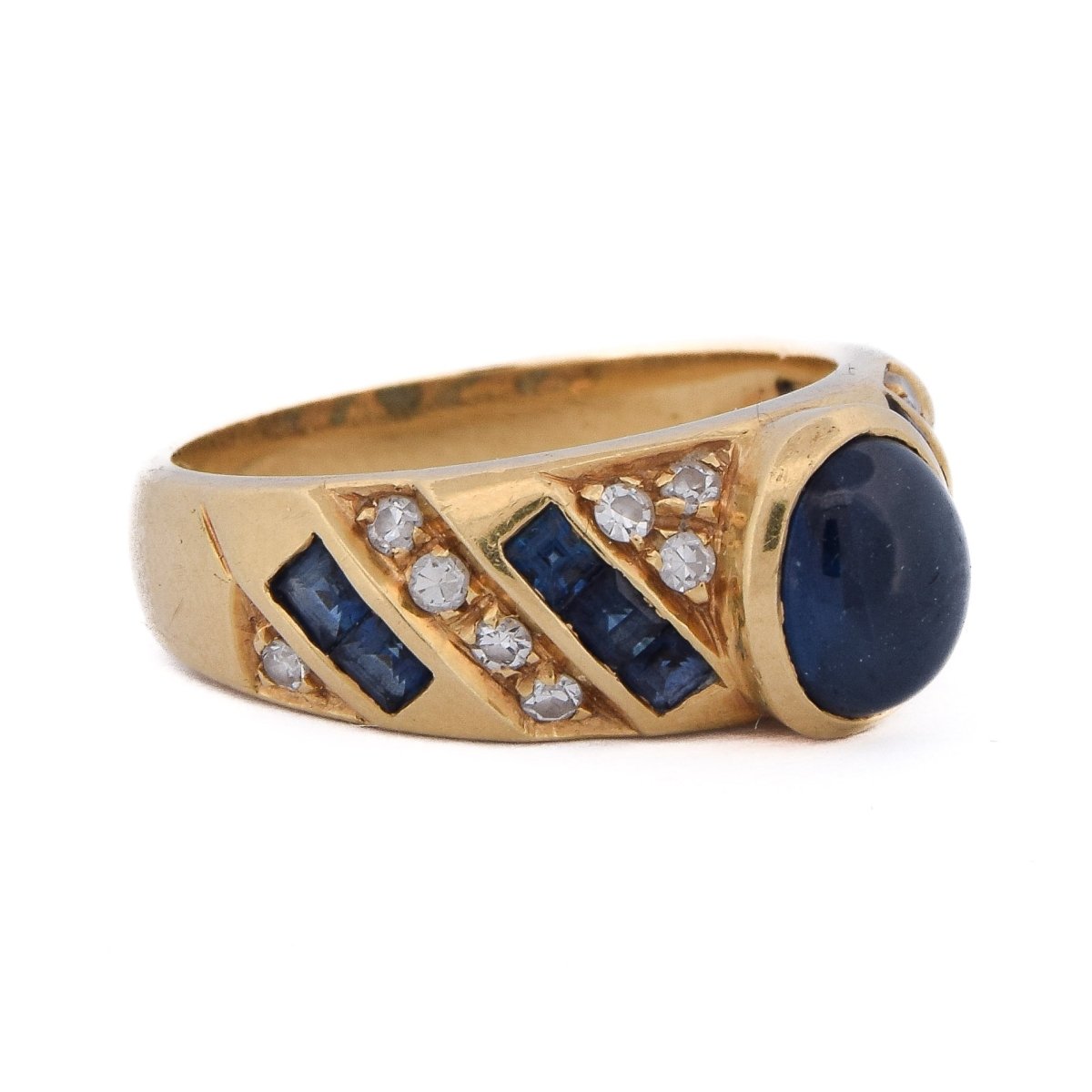 Bague en or jaune, saphirs et diamants - Castafiore