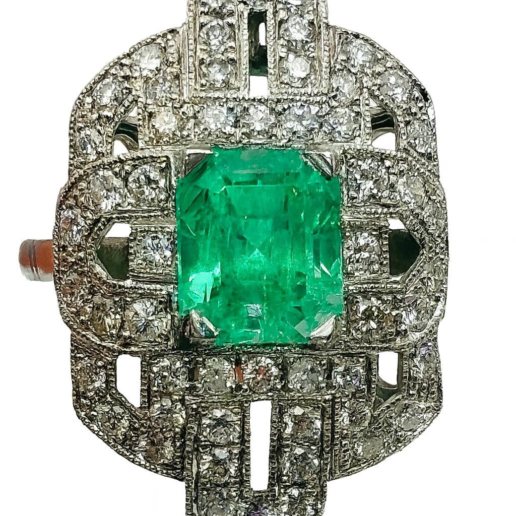 Bague en platine, émeraude et diamants - Castafiore