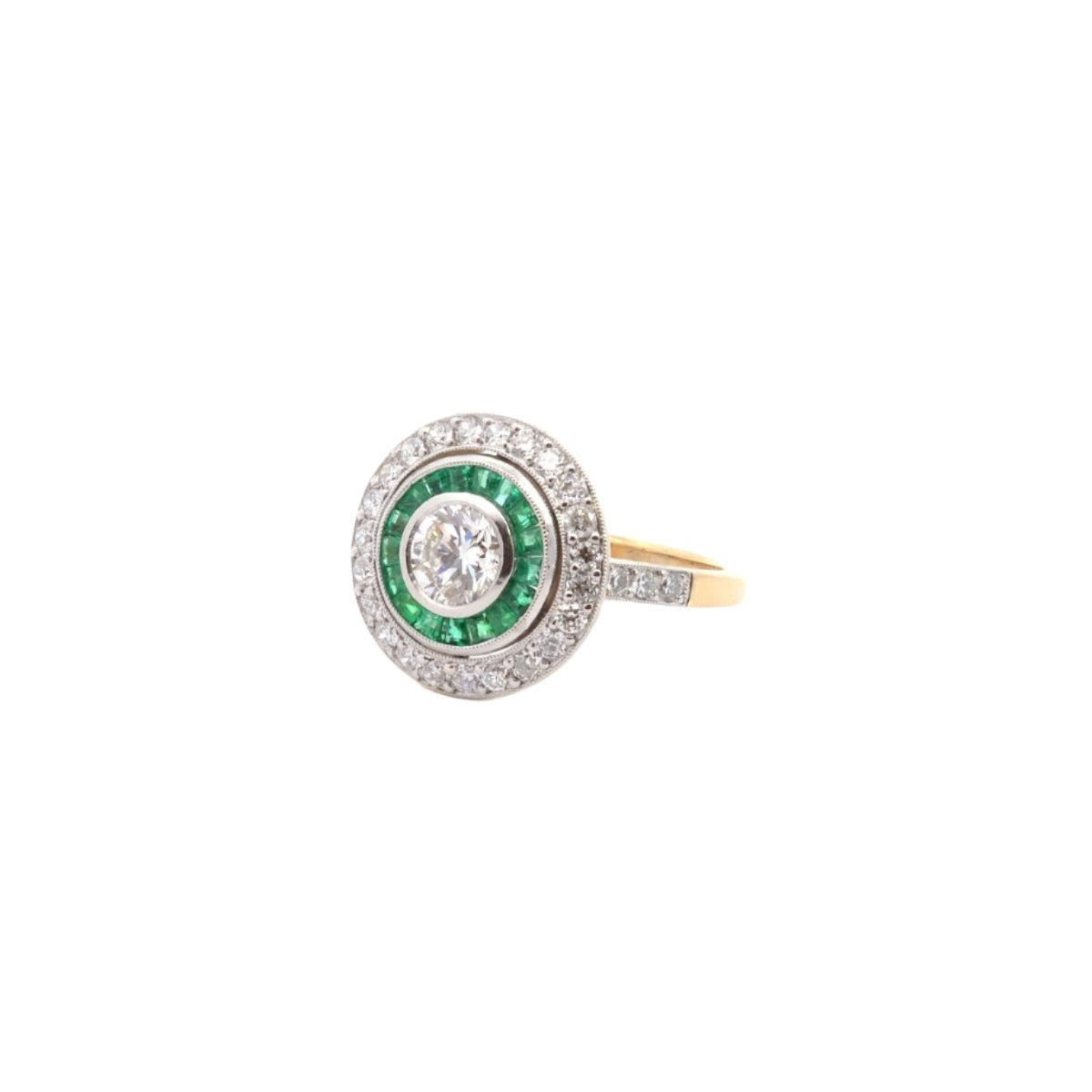 Bague Entourage Art déco en or blanc, platine, émeraudes et diamants - Castafiore