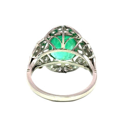Bague Entourage Art Déco en platine, émeraude et diamants - Castafiore