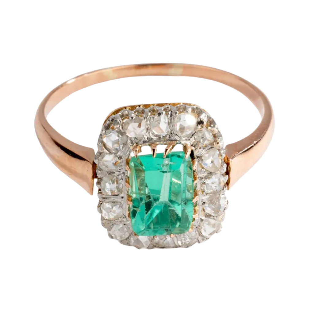 Bague entourage émeraude et diamant. - Castafiore