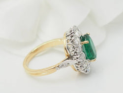 Bague entourage en or bicolore, émeraude et diamants - Castafiore